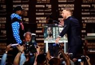 Conor showing off his Capoeira footwork to Floyd...a sign of things to come?